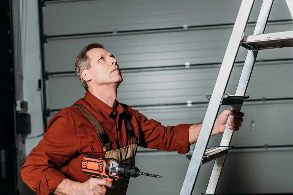 Garage Door Repair Ppc Company 2 Garage door repair specialist on the job client acquired through a ppc company campaign